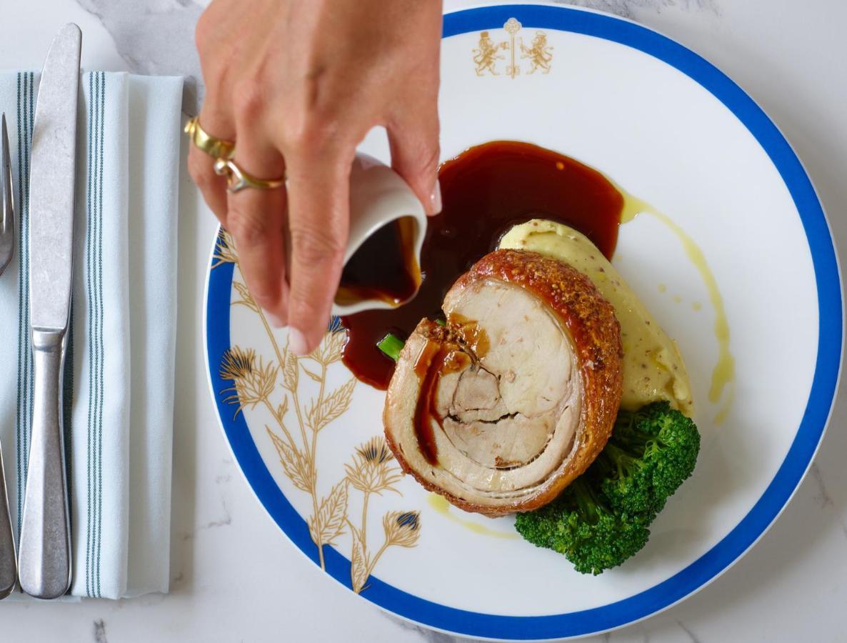 The Mitre, Hampton Court Hotel Kingston upon Thames  Bagian luar foto A pork tenderloin being served